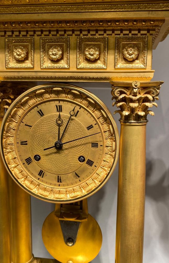 An exceptional ormolu Charles X clock garniture set. 