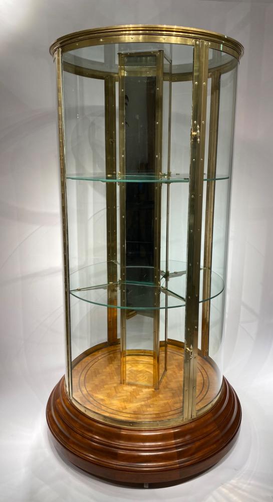 An exceptional round display cabinet