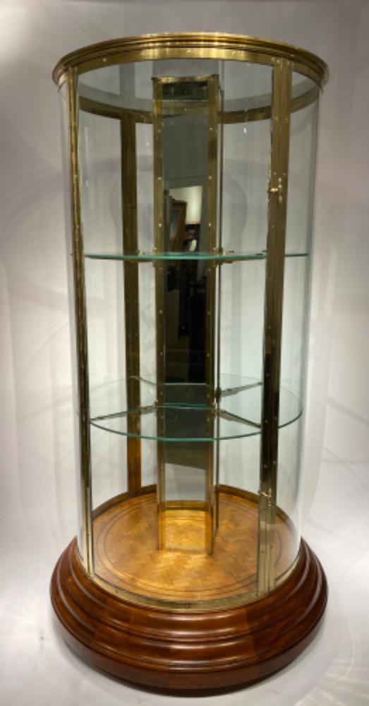 An exceptional round display cabinet