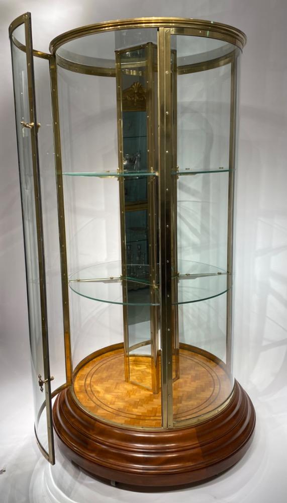 An exceptional round display cabinet