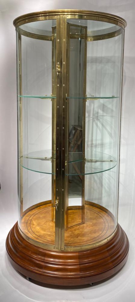 An exceptional round display cabinet