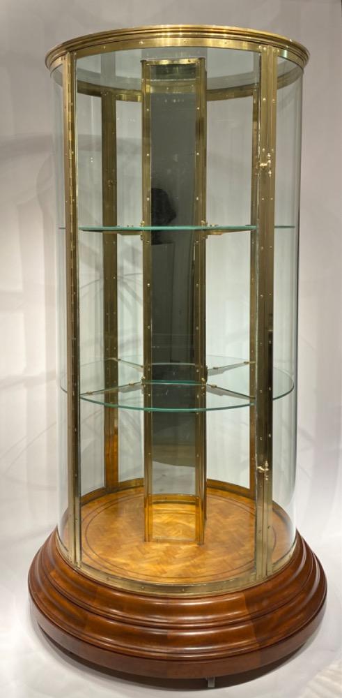 An exceptional round display cabinet