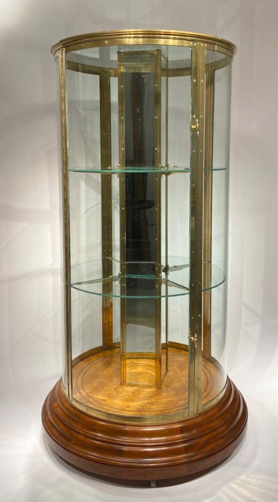 An exceptional round display cabinet