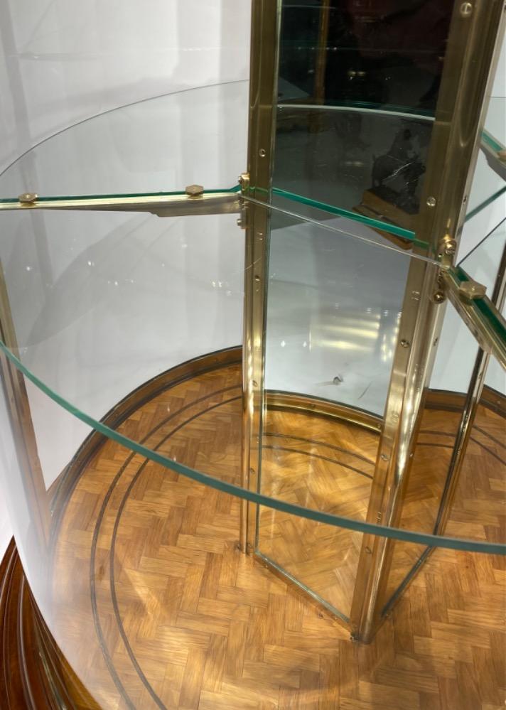 An exceptional round display cabinet