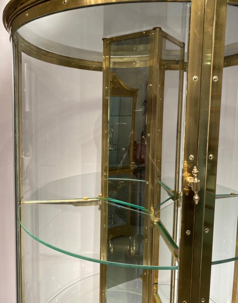 An exceptional round display cabinet