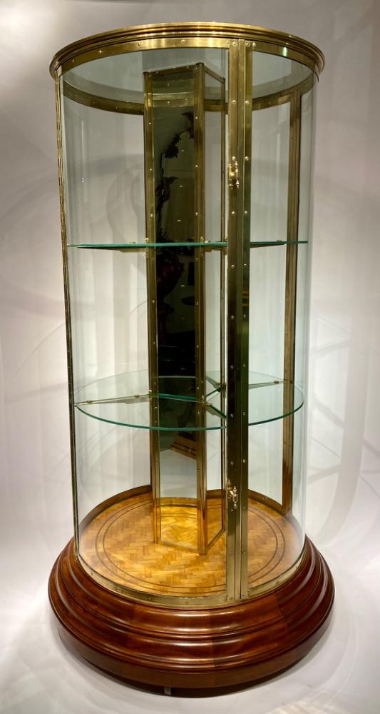 An exceptional round display cabinet