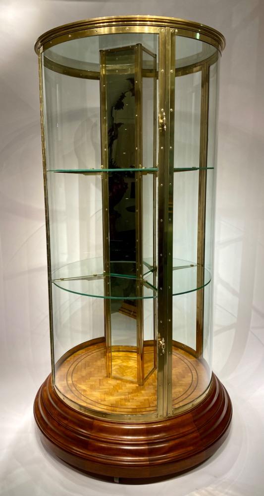 An exceptional round display cabinet