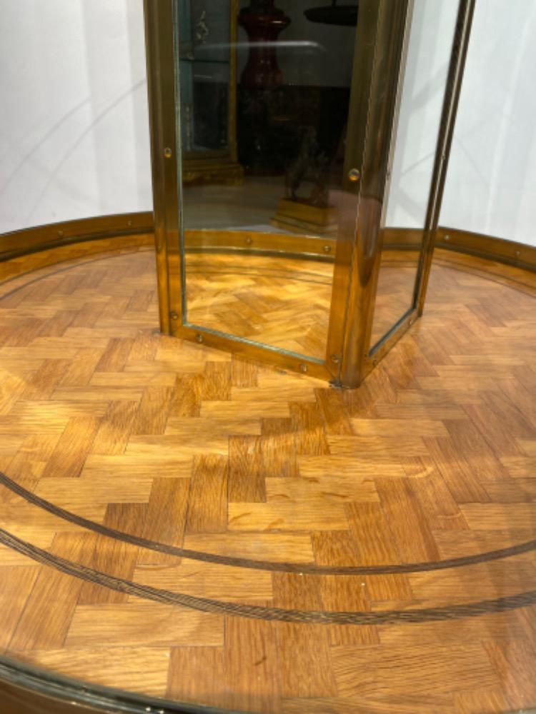 An exceptional round display cabinet