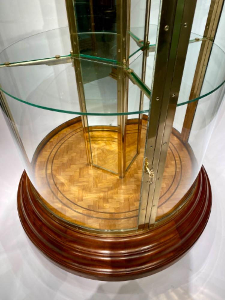 An exceptional round display cabinet