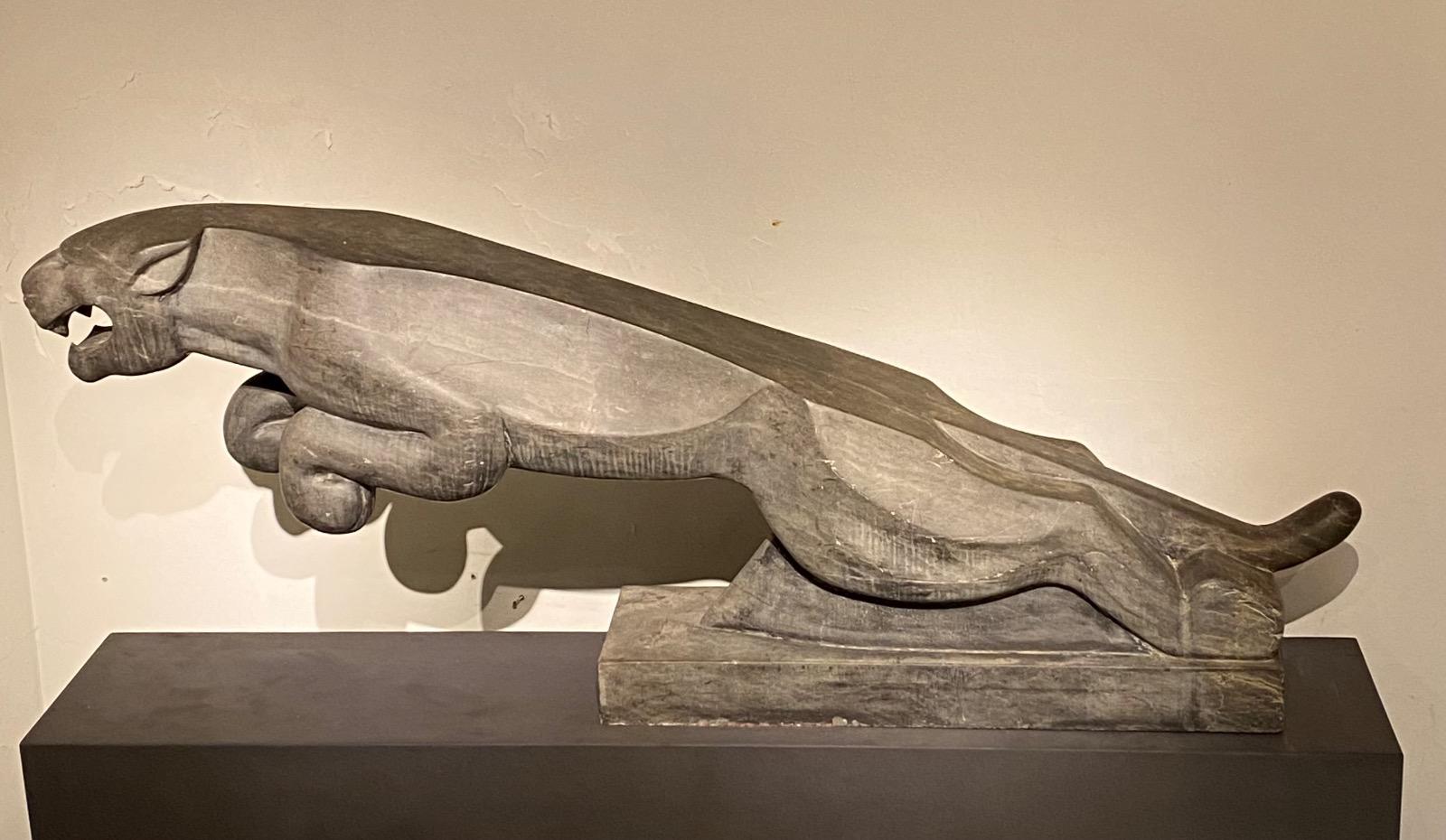 An impressive mid 20thC. life size Art Deco stone Jaguar.