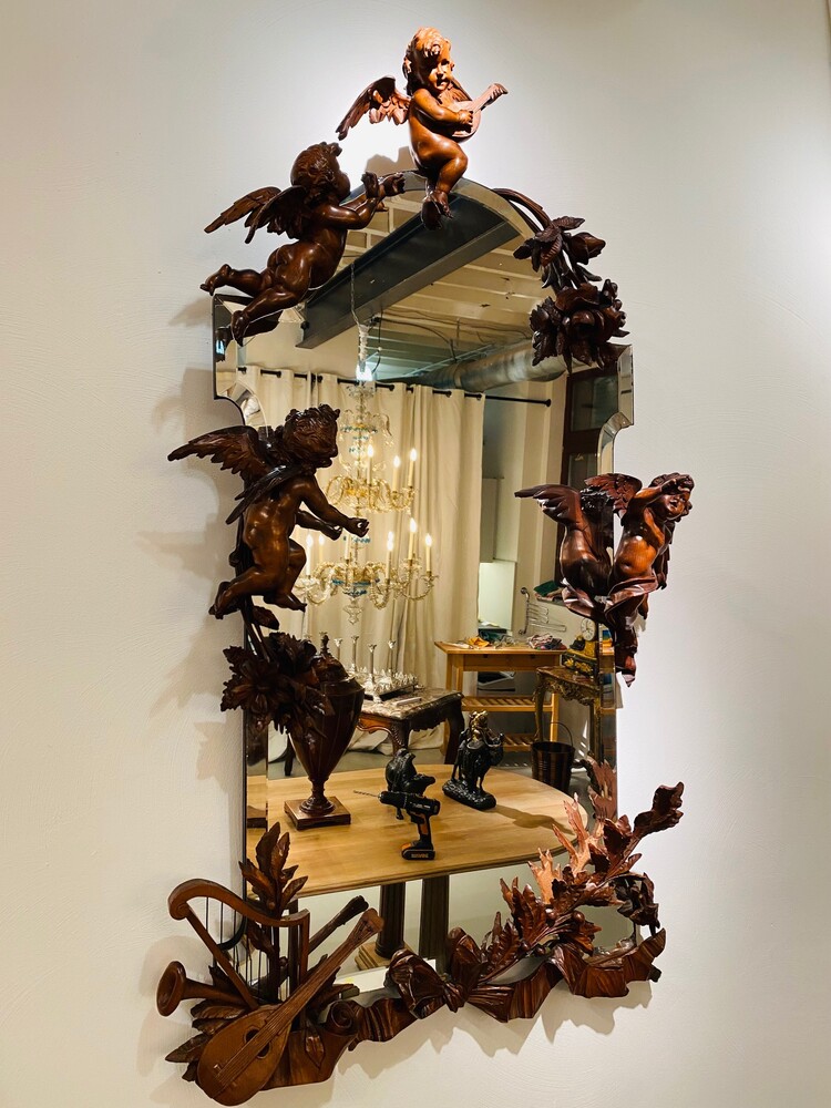 Black forest Carved walnut mirror. 