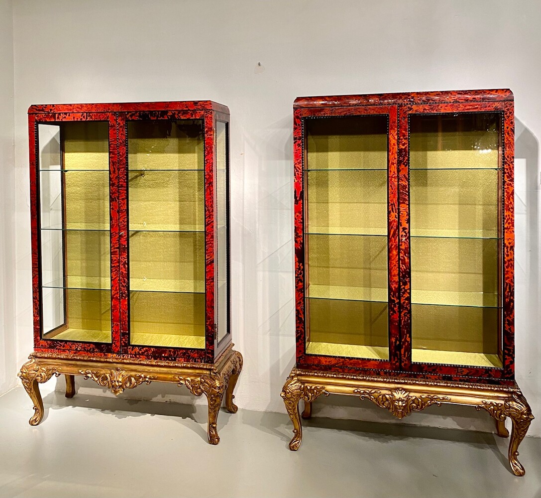 Exceptional pair of Louis XV style red tortoiseshell vitrines.
