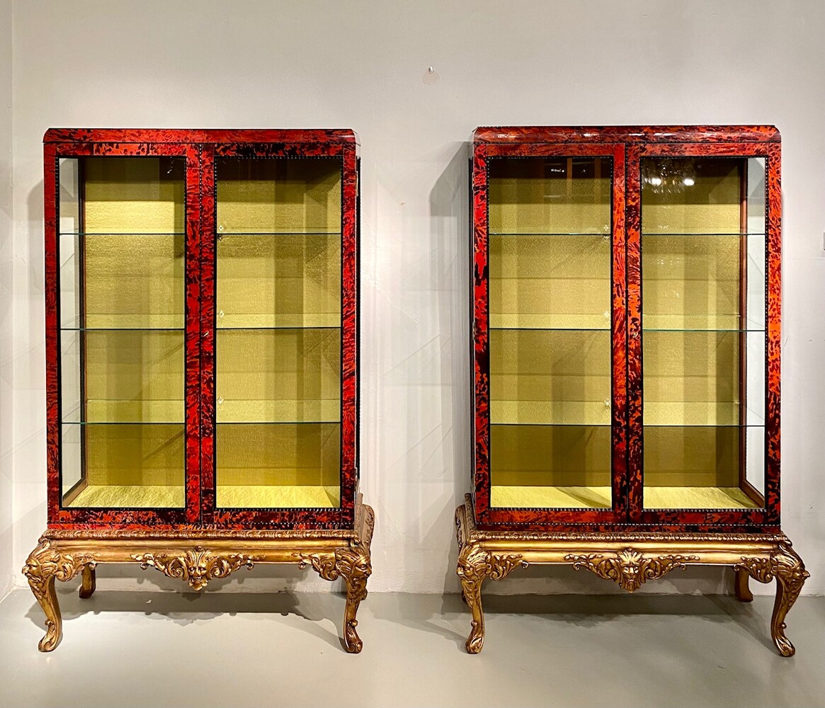 Exceptional pair of Louis XV style red tortoiseshell vitrines.