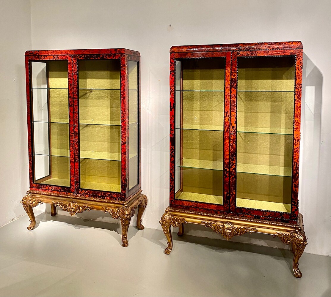 Exceptional pair of Louis XV style red tortoiseshell vitrines.