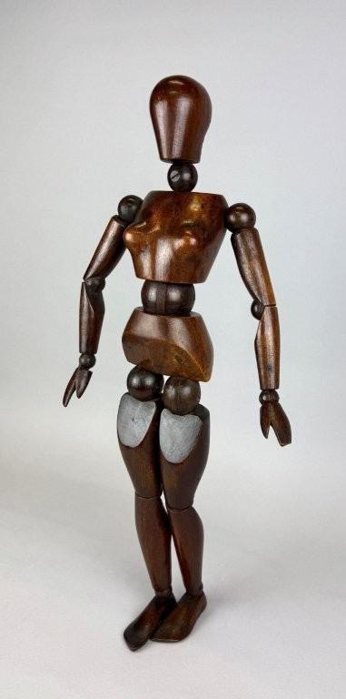 Female Articulated wooden artist mannequin. 