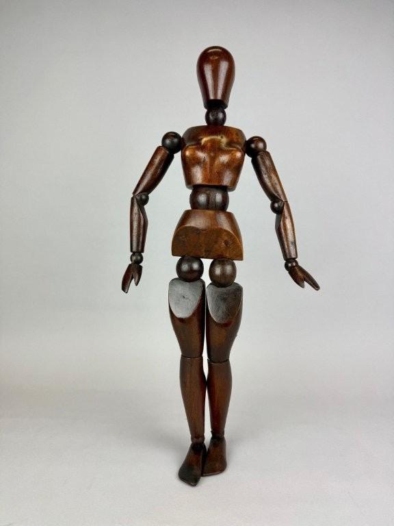 Female Articulated wooden artist mannequin. 
