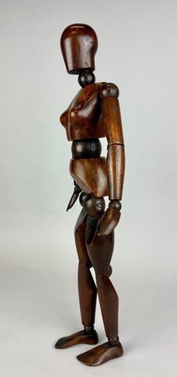 Female Articulated wooden artist mannequin. 