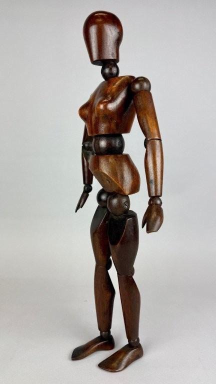 Female Articulated wooden artist mannequin. 