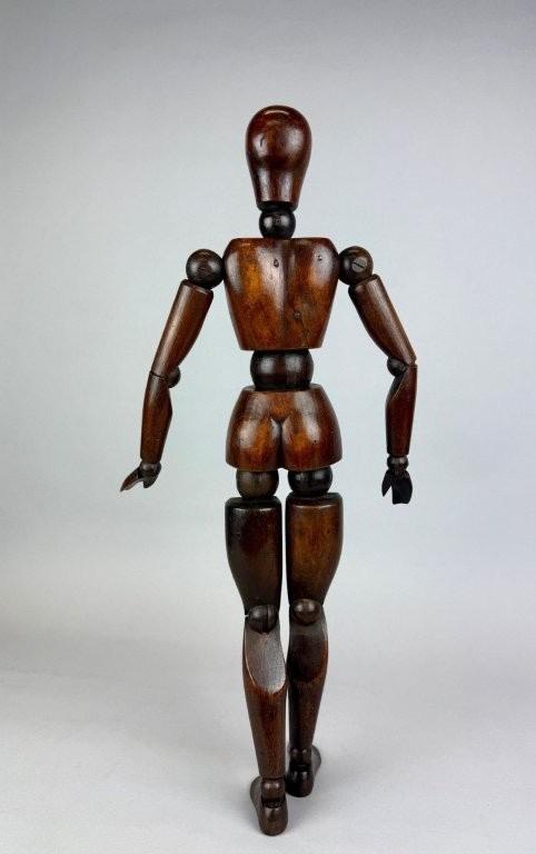Female Articulated wooden artist mannequin. 
