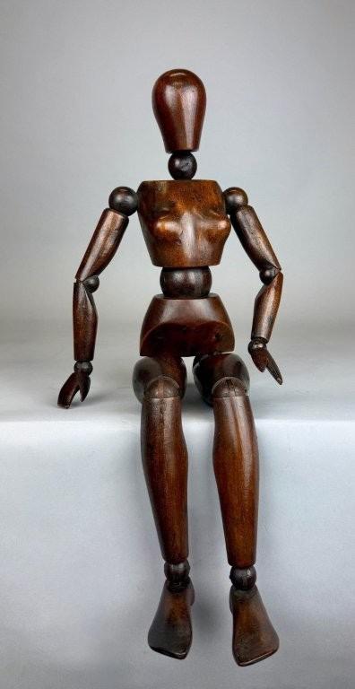 Female Articulated wooden artist mannequin. 