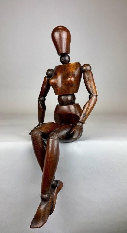 Female Articulated wooden artist mannequin. 