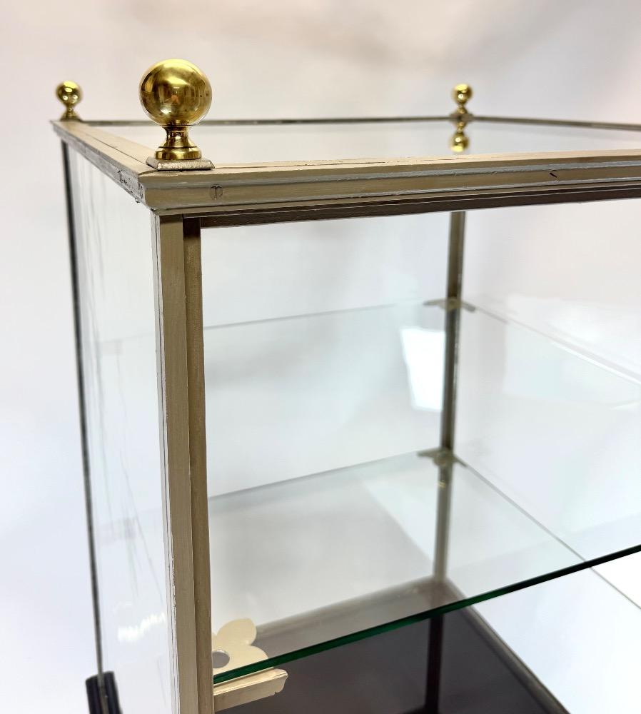 Freestanding iron display cabinet