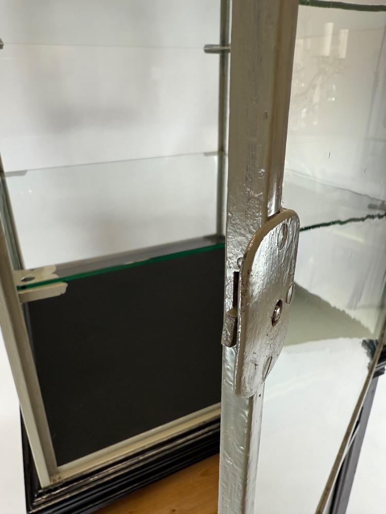 Freestanding iron display cabinet