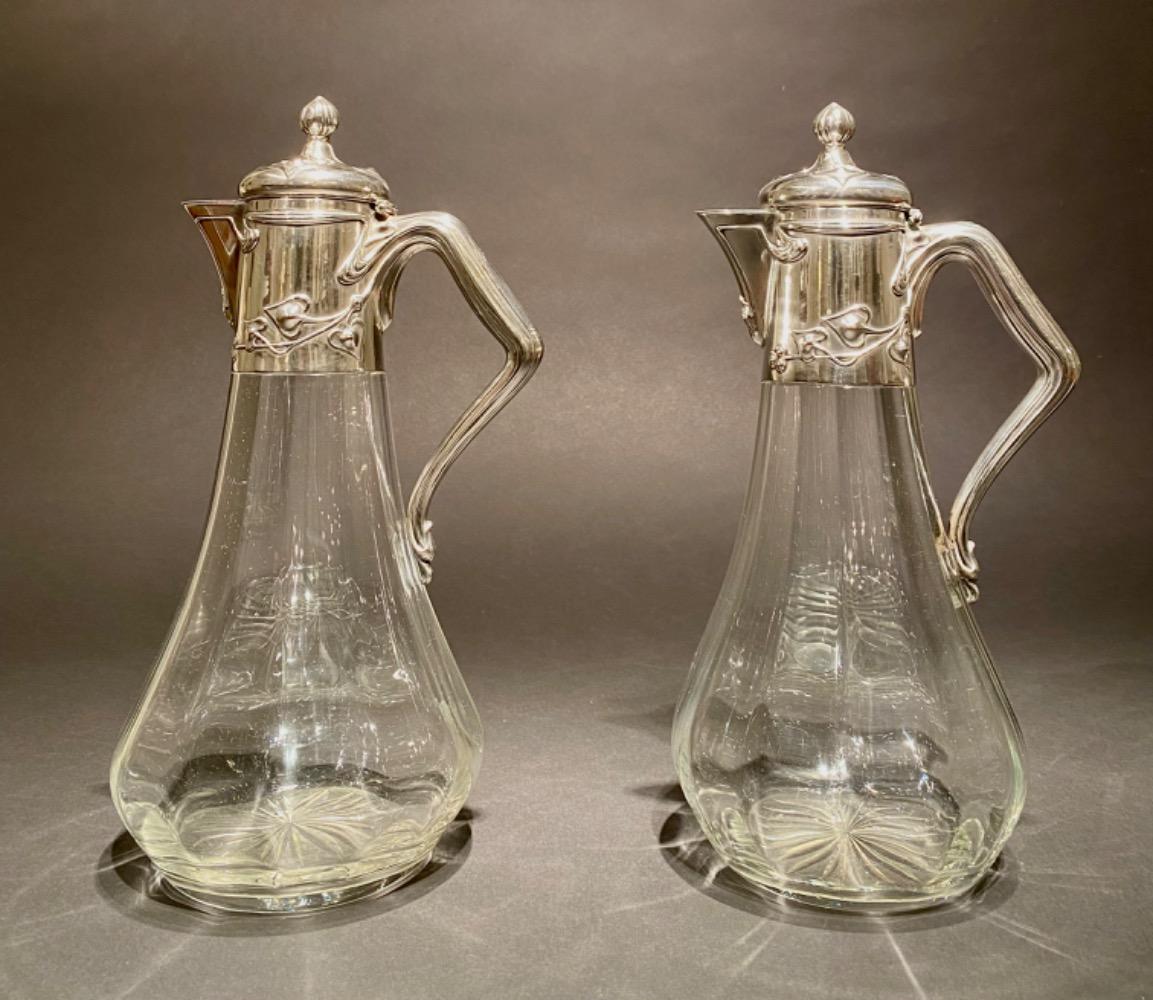 Pair of Art Nouveau silver decanters. 