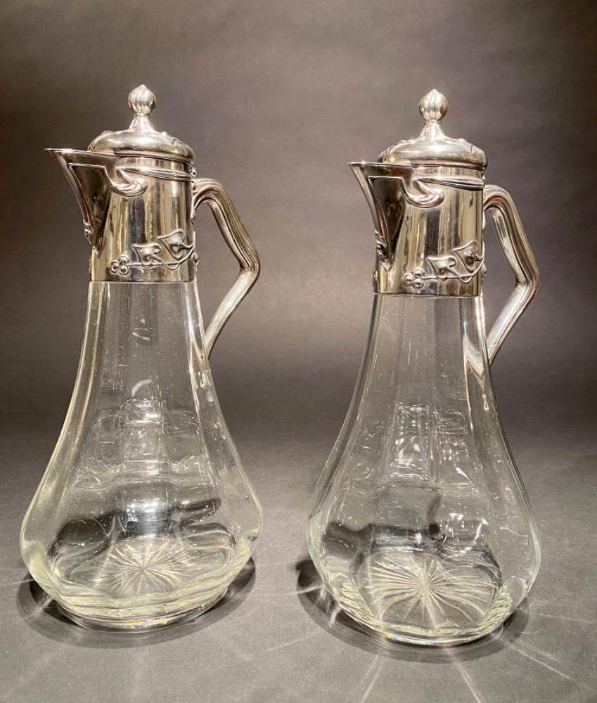 Pair of Art Nouveau silver decanters. 