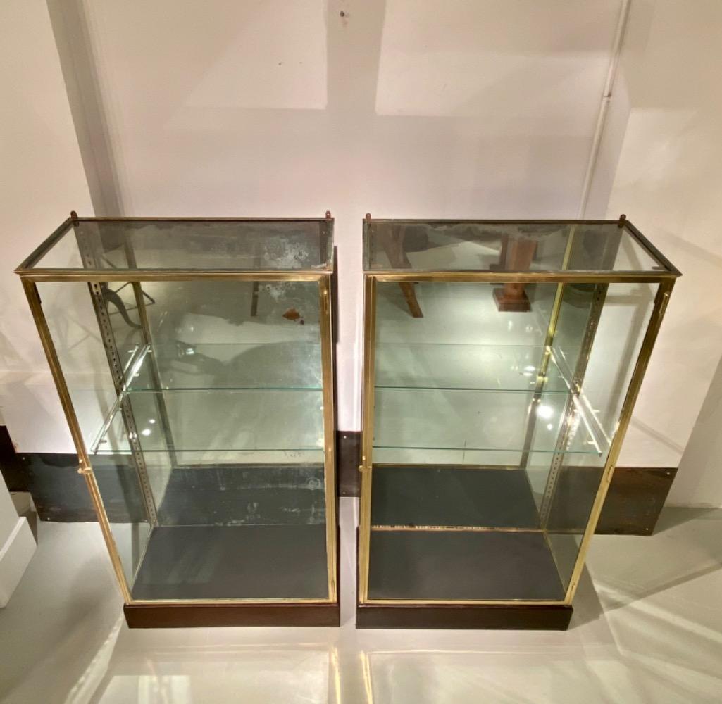 Pair of brass display cabinets 