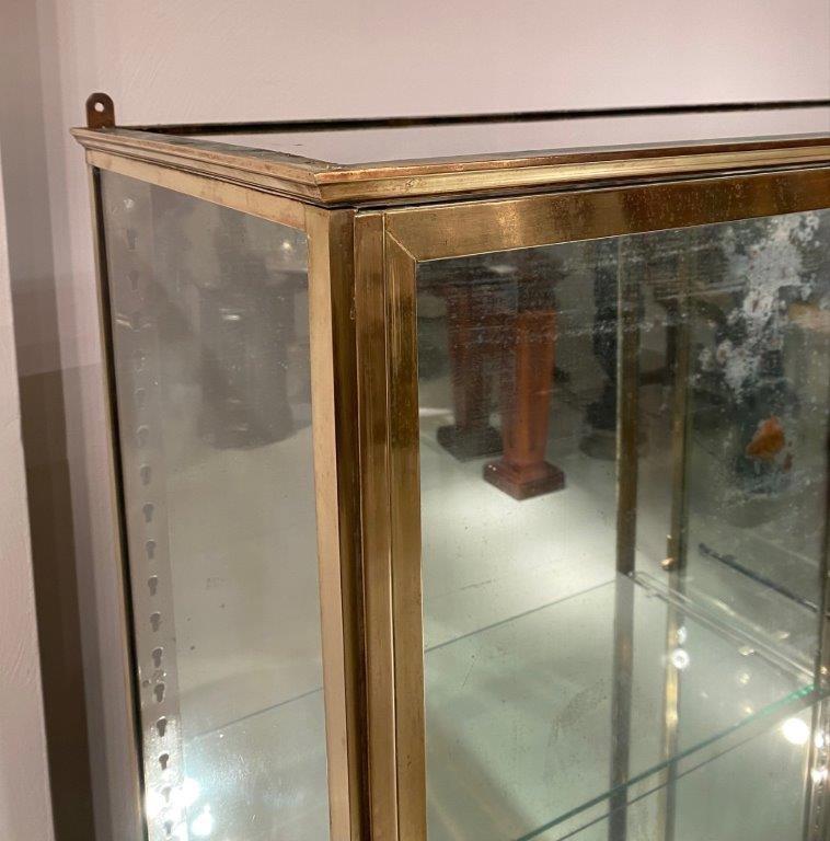 Pair of brass vitrines 