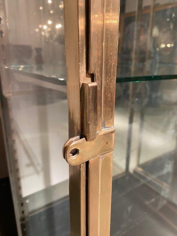 Pair of brass vitrines 