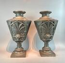 Pair of cast-iron vases. Dated 1925. 