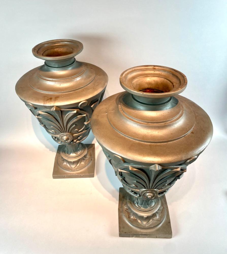 Pair of cast-iron vases. Dated 1925. 
