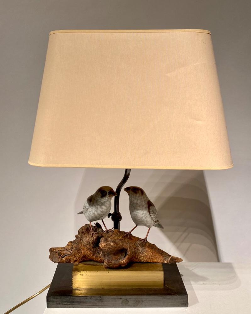 Pair Of Vintage Hollywood Regency style table Lamps with carved wooden birds.