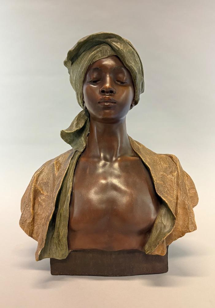 Terracotta bust of a Nubian boy by Goldscheider