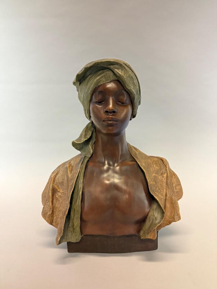 Terracotta bust of a Nubian boy by Goldscheider