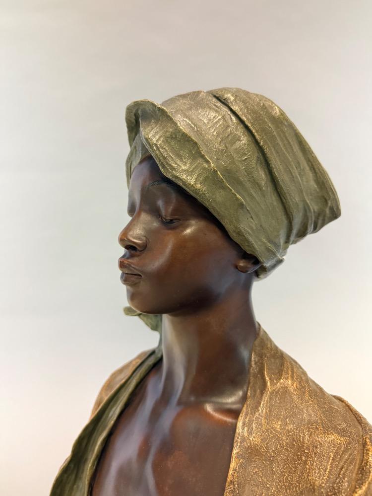 Terracotta bust of a Nubian boy by Goldscheider