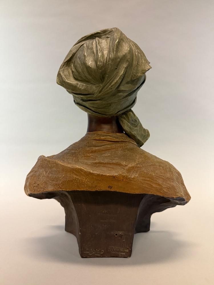 Terracotta bust of a Nubian boy by Goldscheider